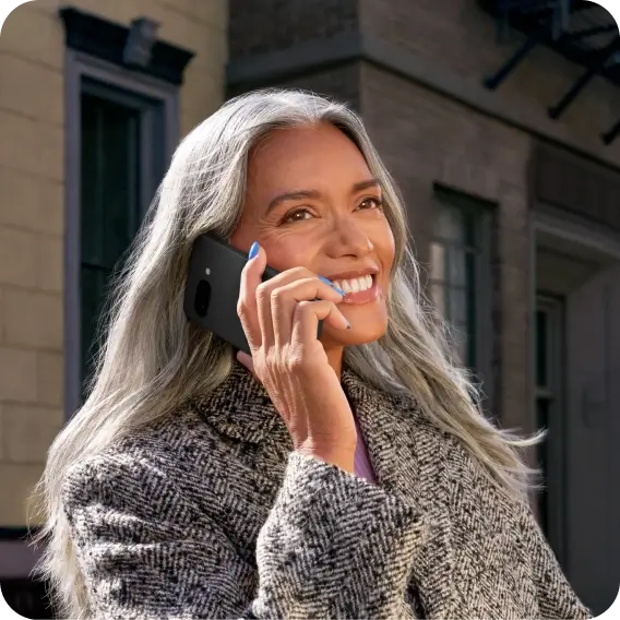 Woman talking on the Google Pixel 9a